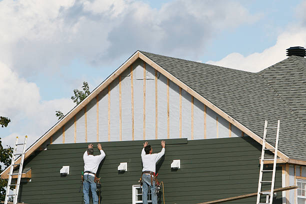 Professional Siding Replacement technician working in Blackstone, VA